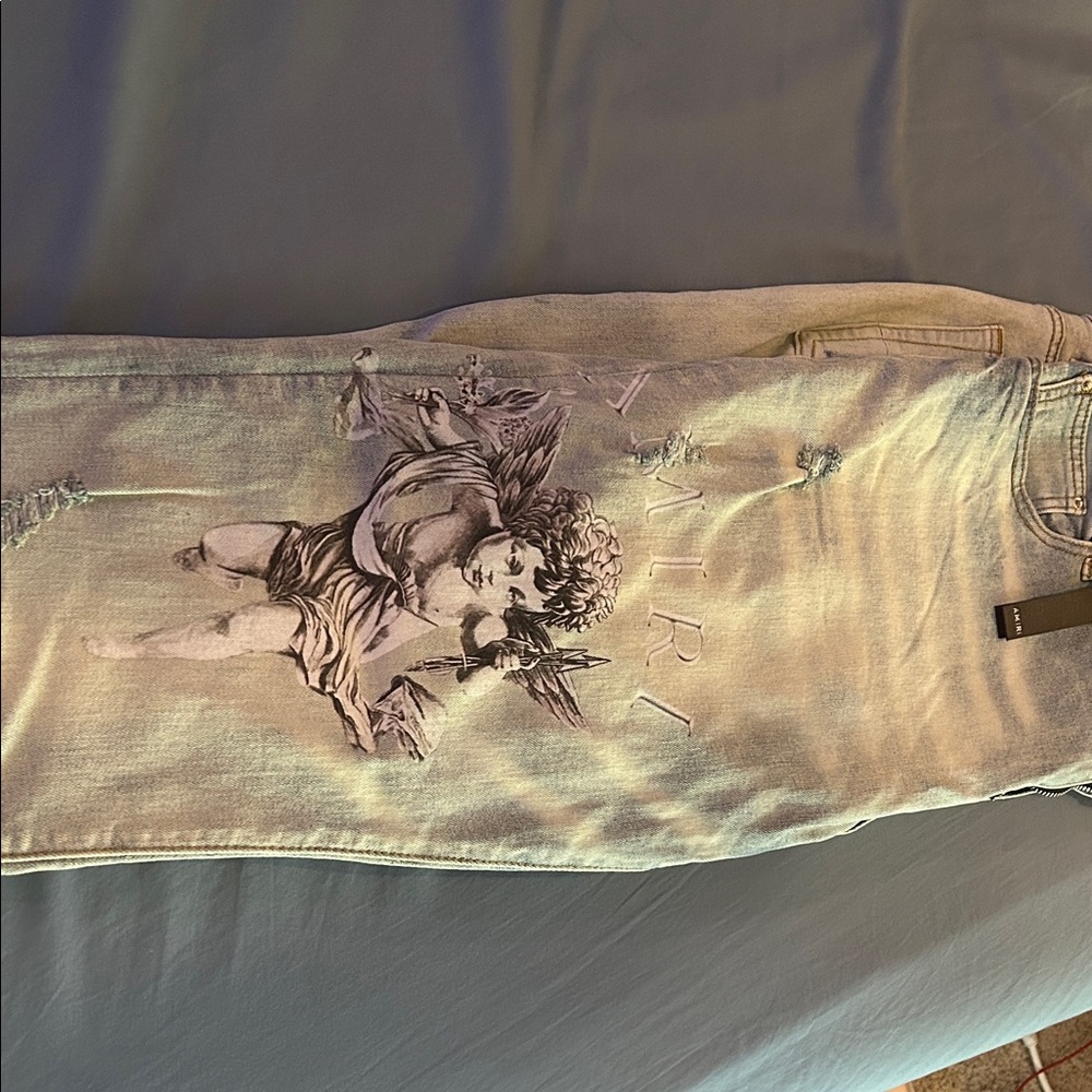 AMIRI Light Blue Jeans with Angel Print